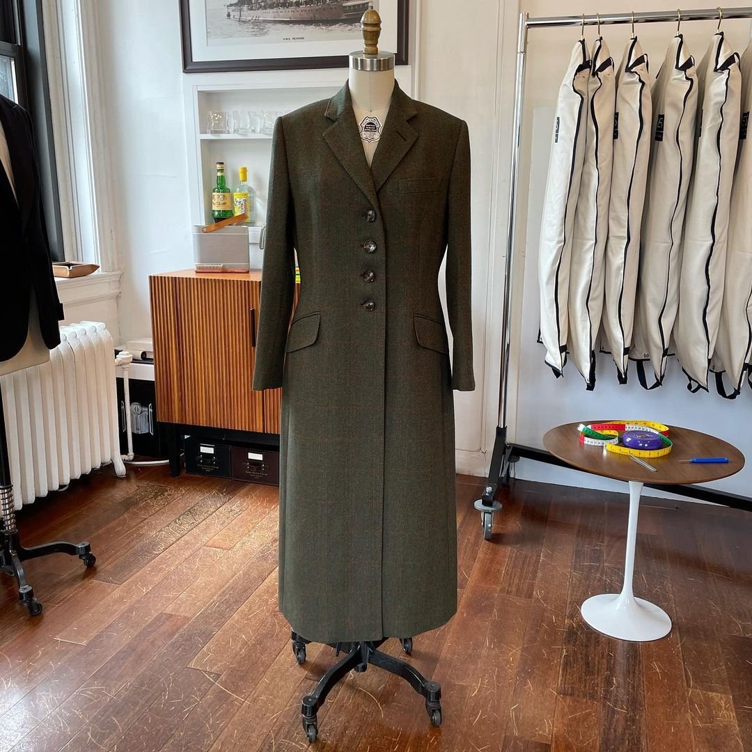 Beautiful ladies bespoke coat on tailors dummy