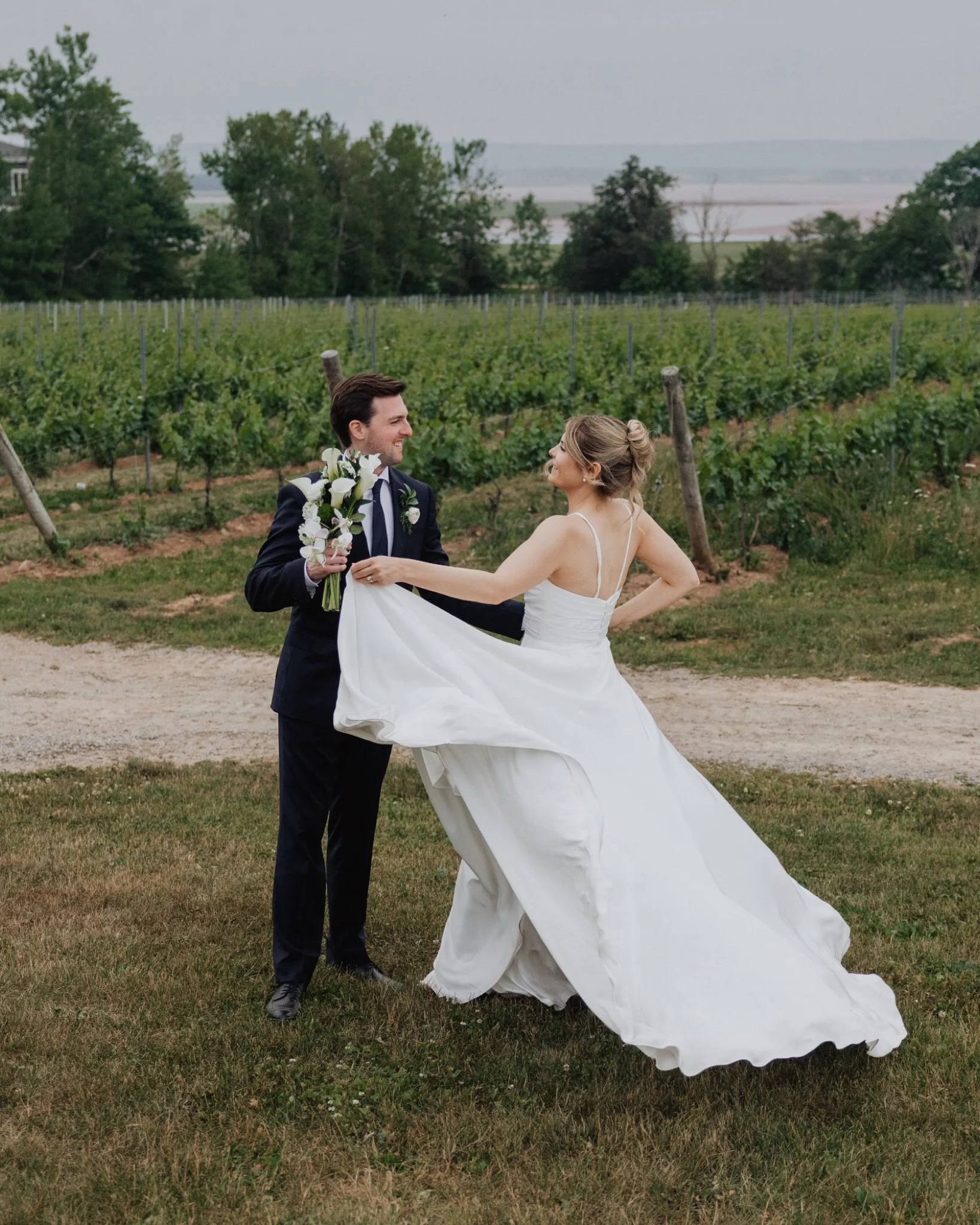 The best weddings remind you that a marriage is never built by two people alone. It&rsquo;s held up by a whole community cheering them on.
.
Here&rsquo;s to you both, Emily &amp; Andrew!
.
Team:
.
Venue: Lightfoot &amp; Wolfville Vineyards @lwwines 
