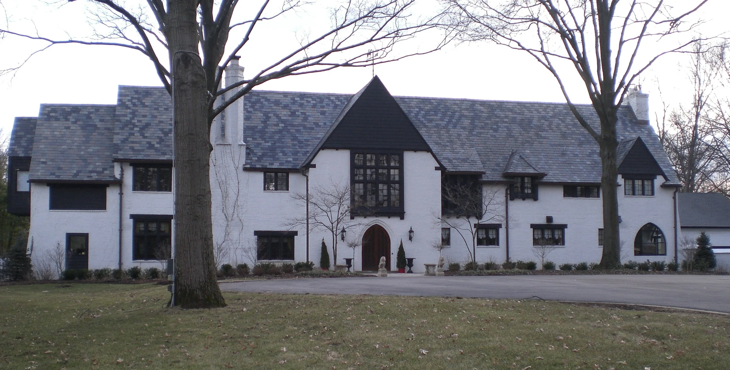  Ill-advised alterations can be seen at the left end of the house.    