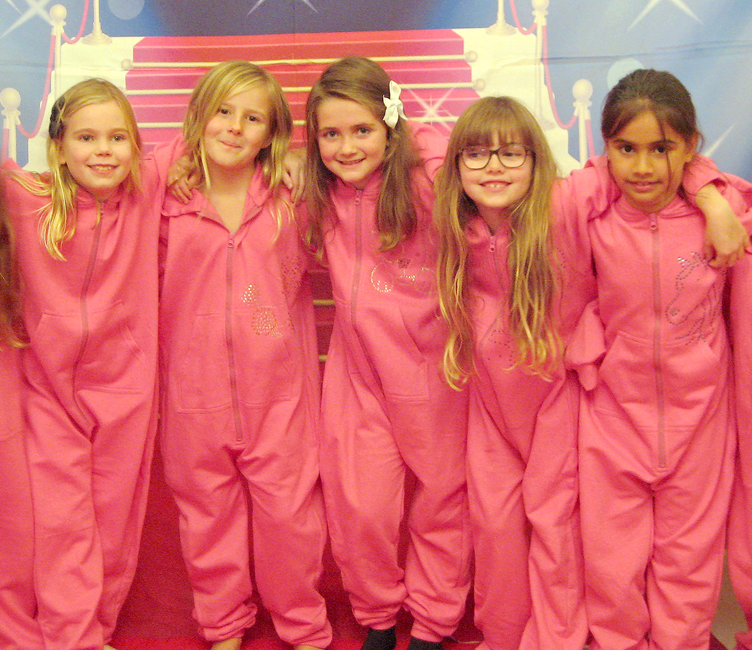 girls showcasing their onesie's made at luvlybubbly