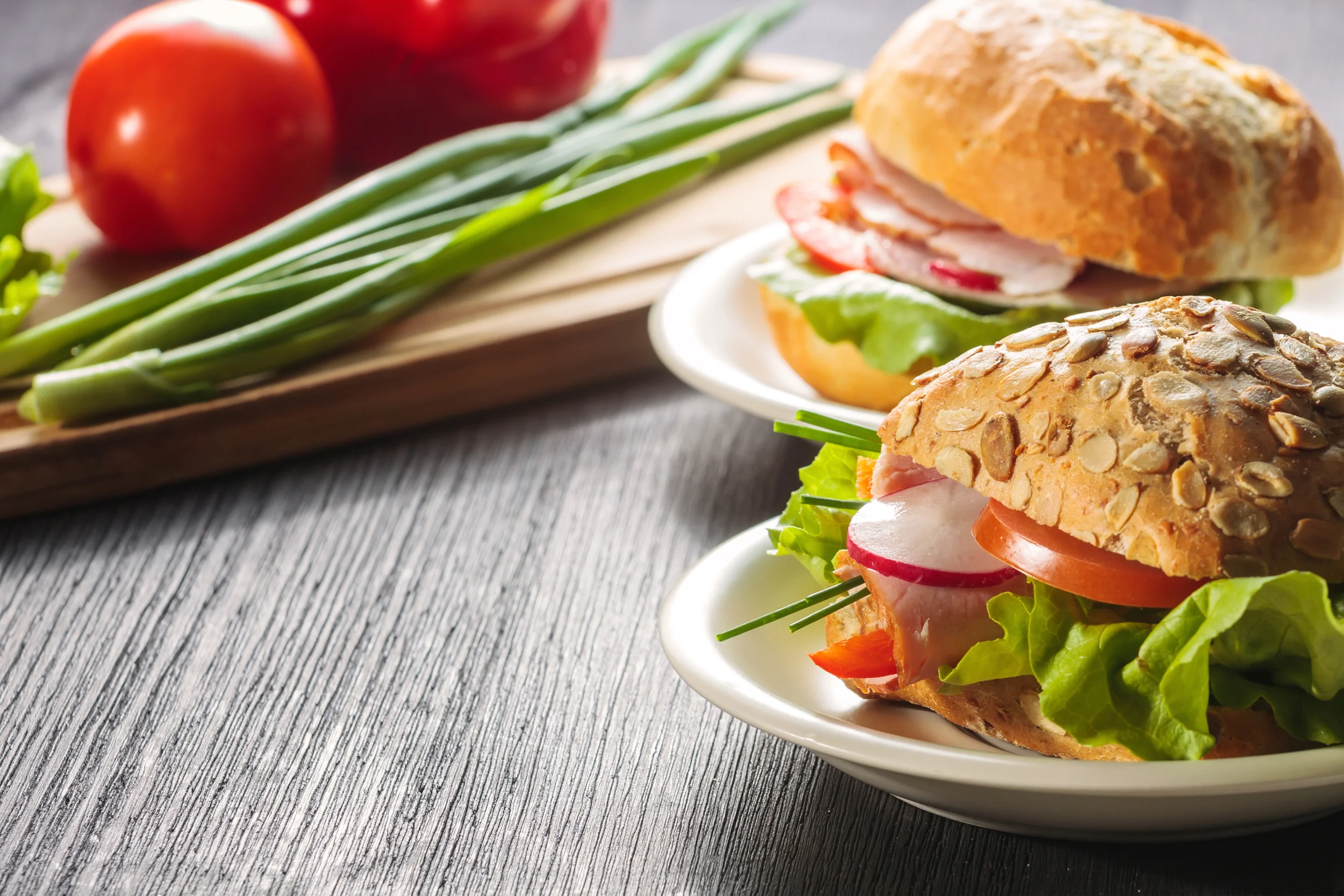 BLT By Dawn Swope There is nothing like a classic BLT sandwich that screams SUMMER. If your bacon is nitrate free, organic, and preferably from a local farm, your bread is NOT whole wheat, preferably with nothing artificial (READ THE INGREDIENTS LABEL), and you use vine ripened tomatoes, I consider this sandwich guilt-free. Boost nutrition by adding greens, herbs, and/or veggies. Ingredients: · 2 slices of whole grain or sour dough bread or bread of choice · 1 tablespoon mayonnaise, preferably all natural (optional) · sliced vine ripened tomato · 2-3 slices of organic bacon · 1 leaf of romaine lettuce or other leafy green of your choice · 3 sprigs of parsley · Optional boosts: add radish, scallion, Napa cabbage, avocado, sprouts, etc. Wash all produce and pat dry. Slice tomato into desired thickness. Cook bacon. I like to line a tray with aluminum foil and bake bacon in a 400-degree oven until done, approximately 15 minutes. Toast bread then spread mayo. Assemble sandwich and enjoy!