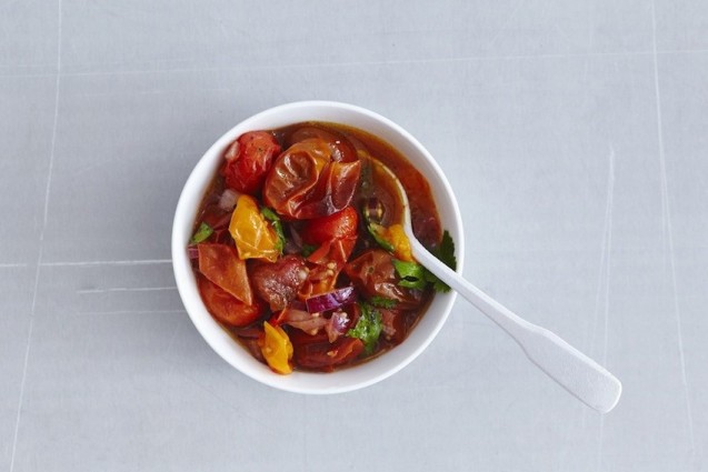 Roasted Tomato Salsa Serves 4 Ingredients 12-14 cherry tomatoes 1/2 a red onion, finely chopped handful of cilantro, finely chopped juice of a lime olive oil salt + pepper Preparation 1. Pre-heat oven to 475ºF. 2. Line a baking sheet with parchment or aluminum foil (this is not necessary but makes for easier cleanup). Place the tomatoes on the baking sheet, drizzle with olive oil and season with salt and pepper. Place in the oven and bake for 10-15 minutes until slightly browned. Remove and let cool. 3. Place the tomatoes in a bowl with the onion and cilantro. Season with salt and pepper, the lime juice and a olive oil to coat. Mix to combine. Photography by V.K. Rees Recipes + Styling by Christina Liva by mindbodygreenNovember 8, 2014 2:29 AM