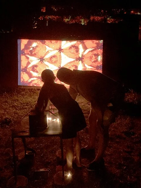 people in front of kaleidoscope installation at a festival