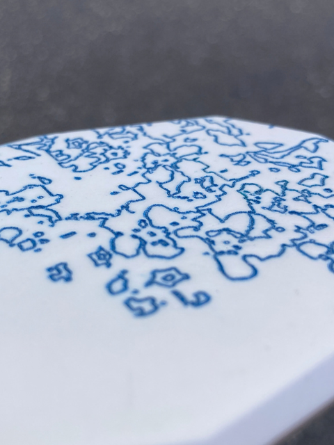 Handmade botanical brooch from the Botanical Traces jewellery series, featuring delicate laser-engraved flower details in plexiglass