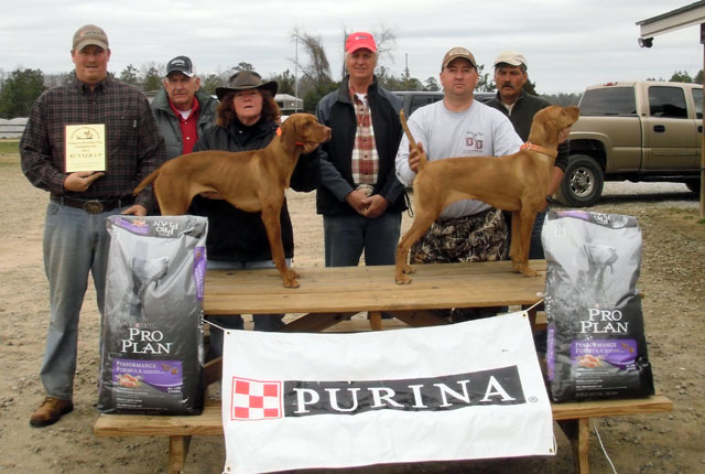Shooting Dog Dogs left to right: runner up - FC AFC Burr Oak’s Quarterback ("Rex"); winner - Touchdown Kid’s Jet City Rose ("Rosie") People left to right: Brian Gingrich, Gus Toombs (judge), Theresa Gimbut, Mark Johnson, Brian long, and Ben Lorenson (judge)