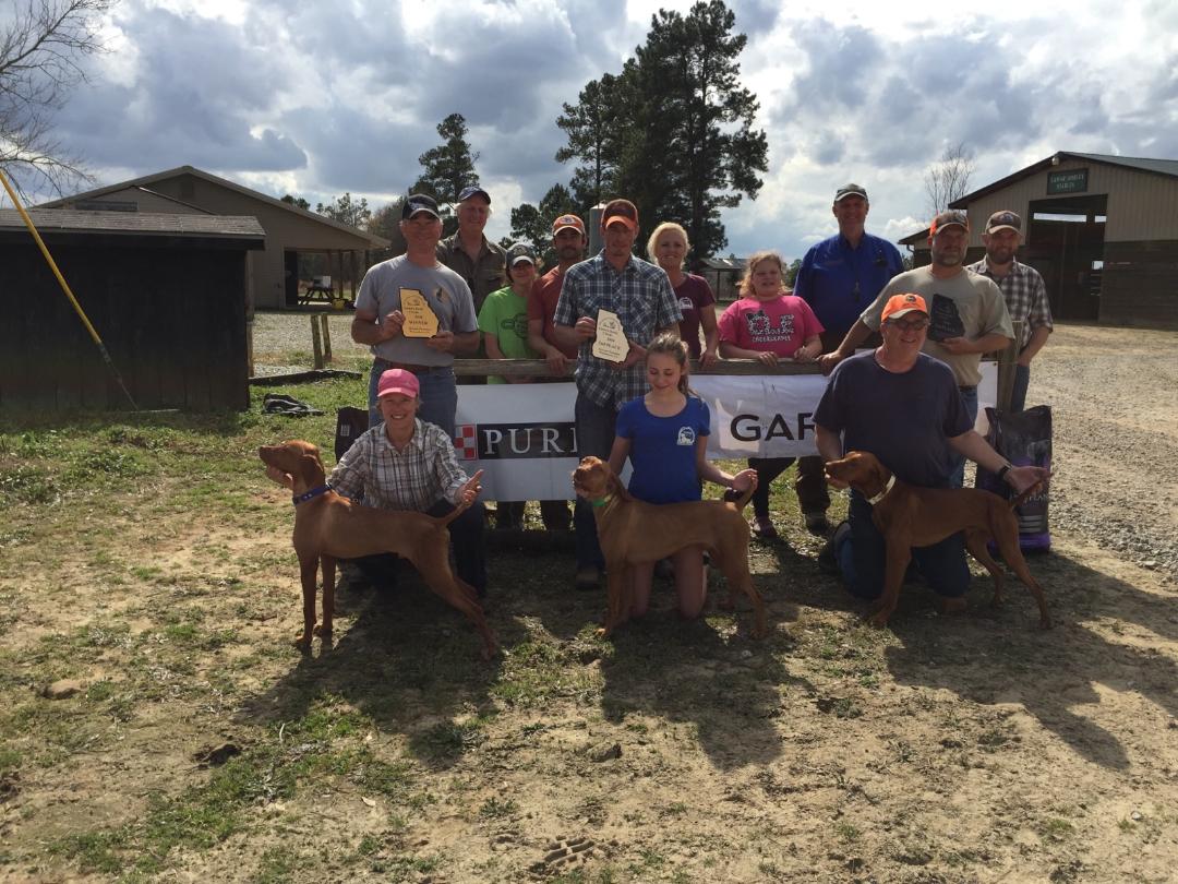 Pictured from Left to Right: Nancy and Chad Chadwell (owner and handler - winner) with Mia’s House of Kalua (Winner), Mark Johnson, Mikayle Syczylo, Mike Syczylo, Brian Fidler (owner and handler – 2nd place dog), Carlie Syczylo with Fidler’s Fight to the Finish (2nd place winner), Carrie Syczylo, Lily Fountain, Jim Carter (Judge), Phil Stout with Winddance Bull Fighter (3rd place winner), Jamie Fountain (handler – 3rd place dog), Andrew Campbell (Judge)