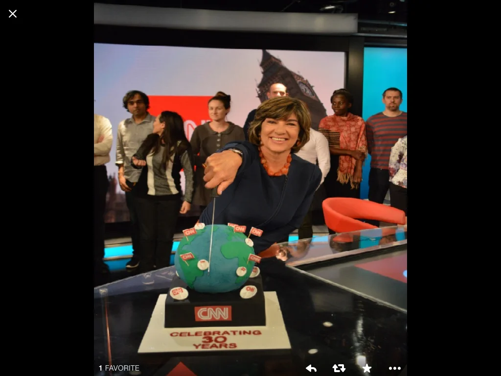 CNN International's Christiane Amanpour cutting the cake we made for the 30th birthday of CNNI's newsroom