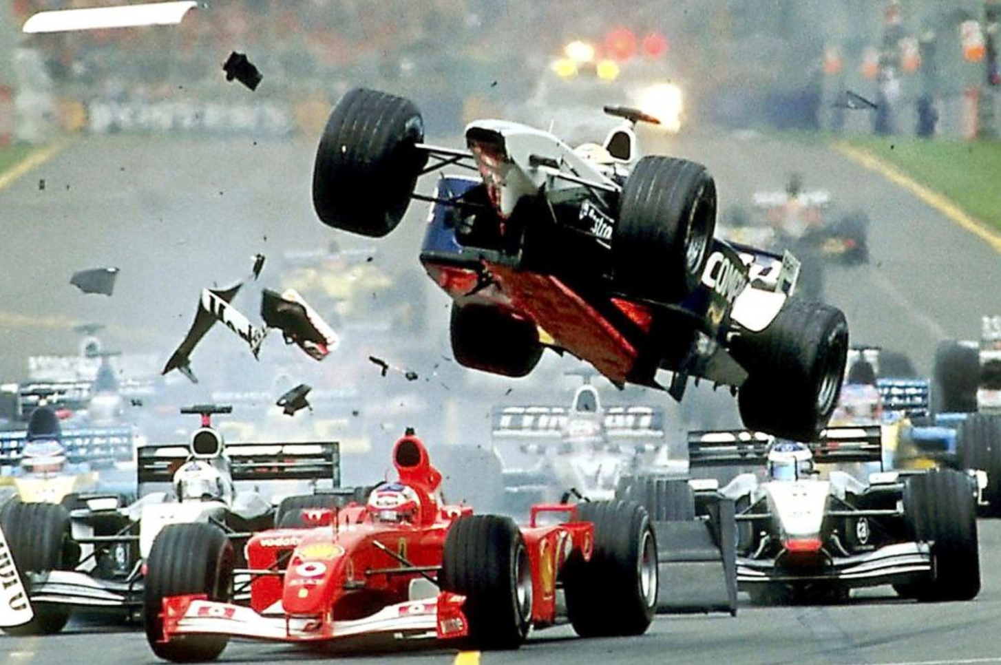 Ralph Schumacher air borne corner 1, lap 1. Melbourne F1 - 2002.