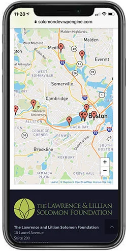 The project map view on an iPhone. Users can click on any project, read a summary, link back to the corresponding project page, or get directions to visit the project in person.