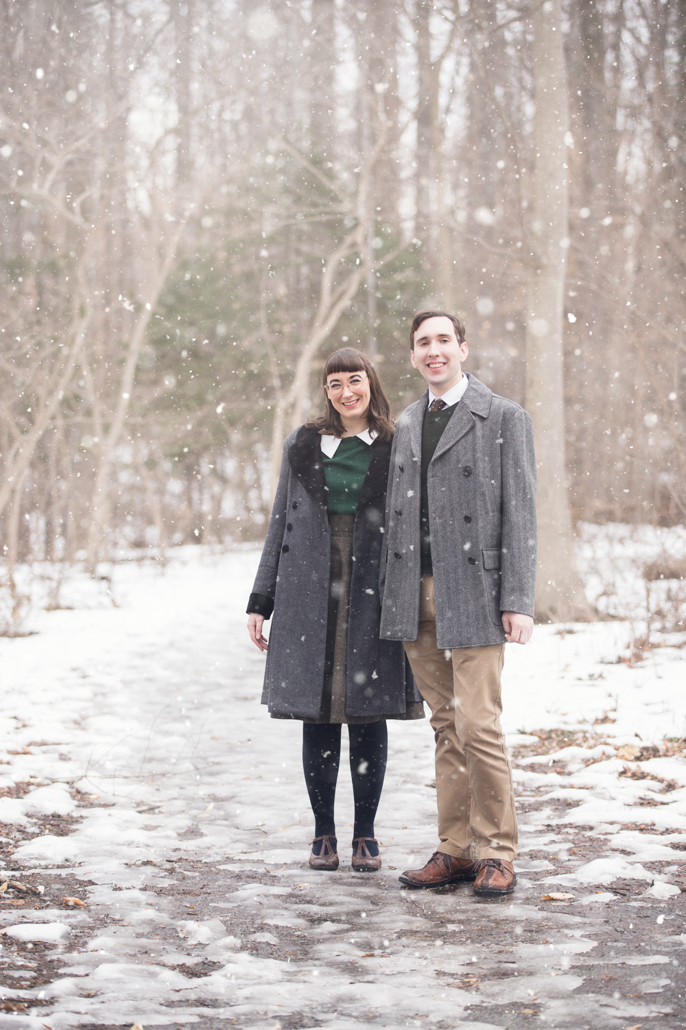 Retro couple in the falling snow