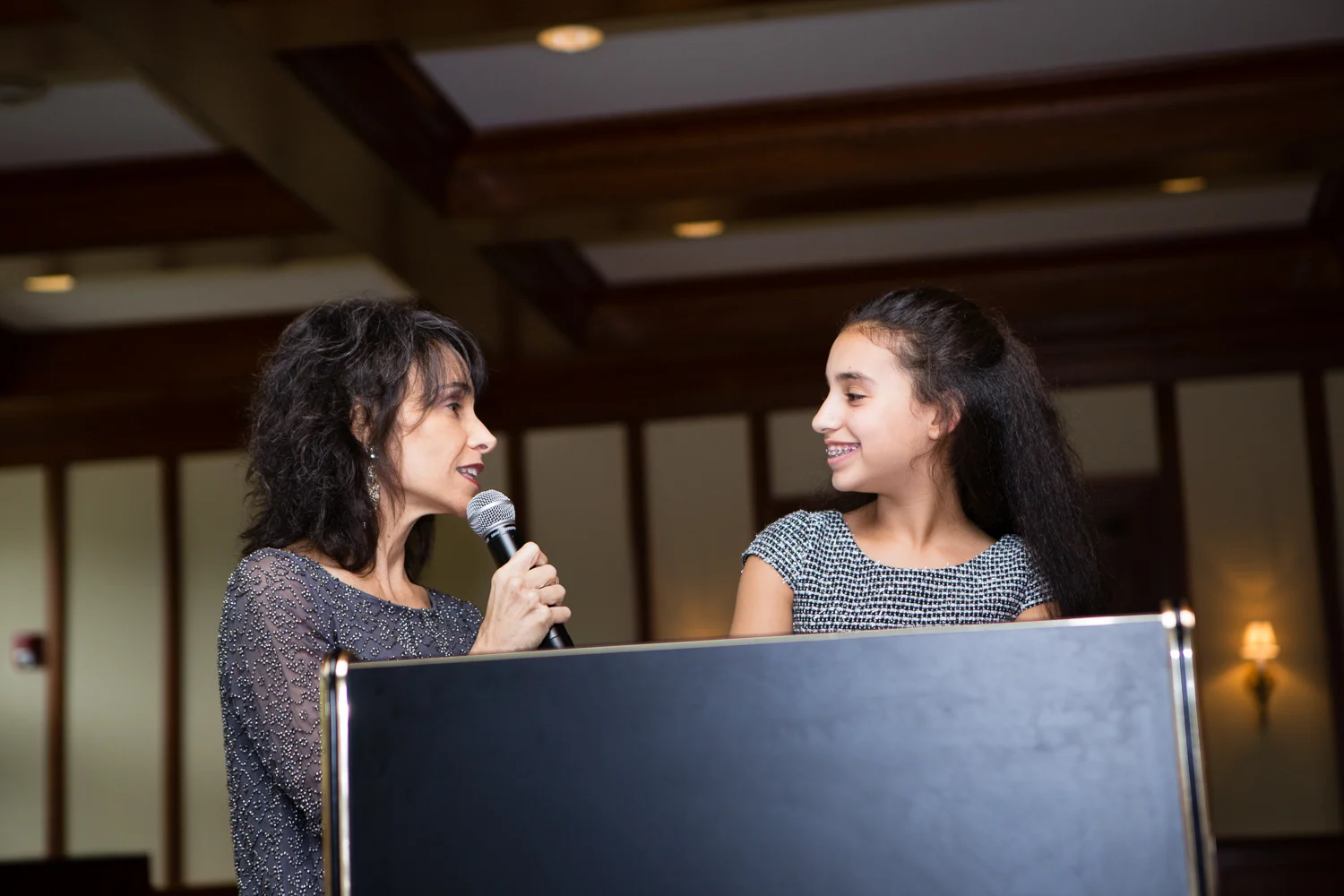 Photo of mother and daughter during bat mitzvah ceremony
