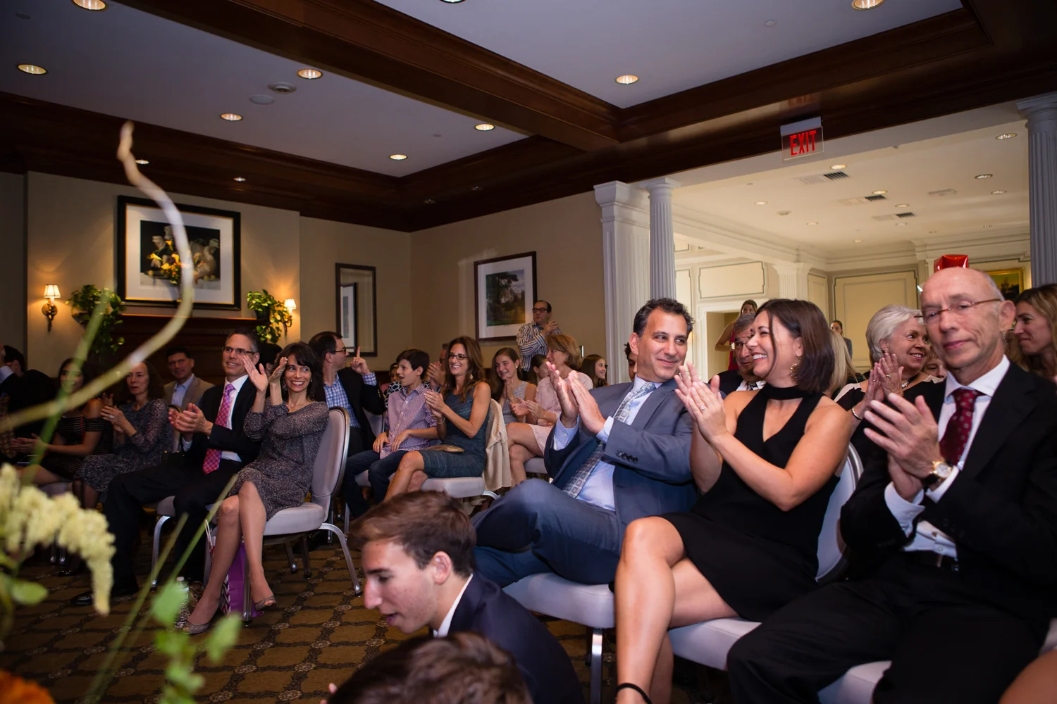 Photo of clapping guests at conclusion of Bat Mitzvah speech