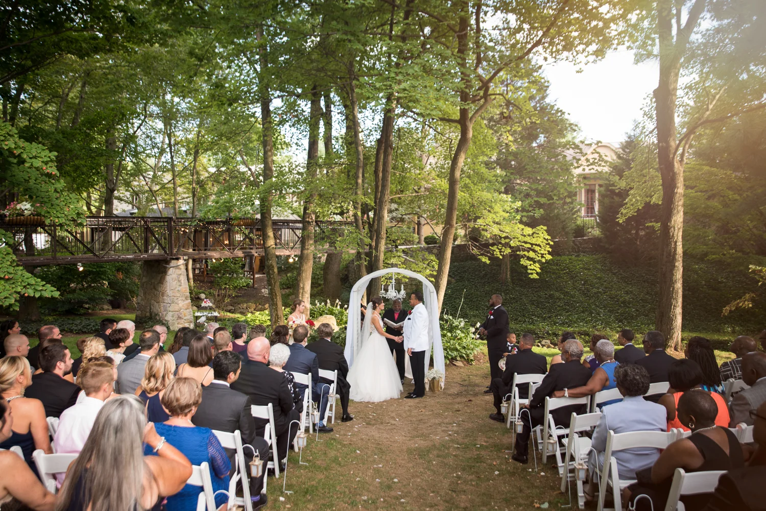 Photo of outdoor wedding ceremony at The Pomme in Radnor, PA