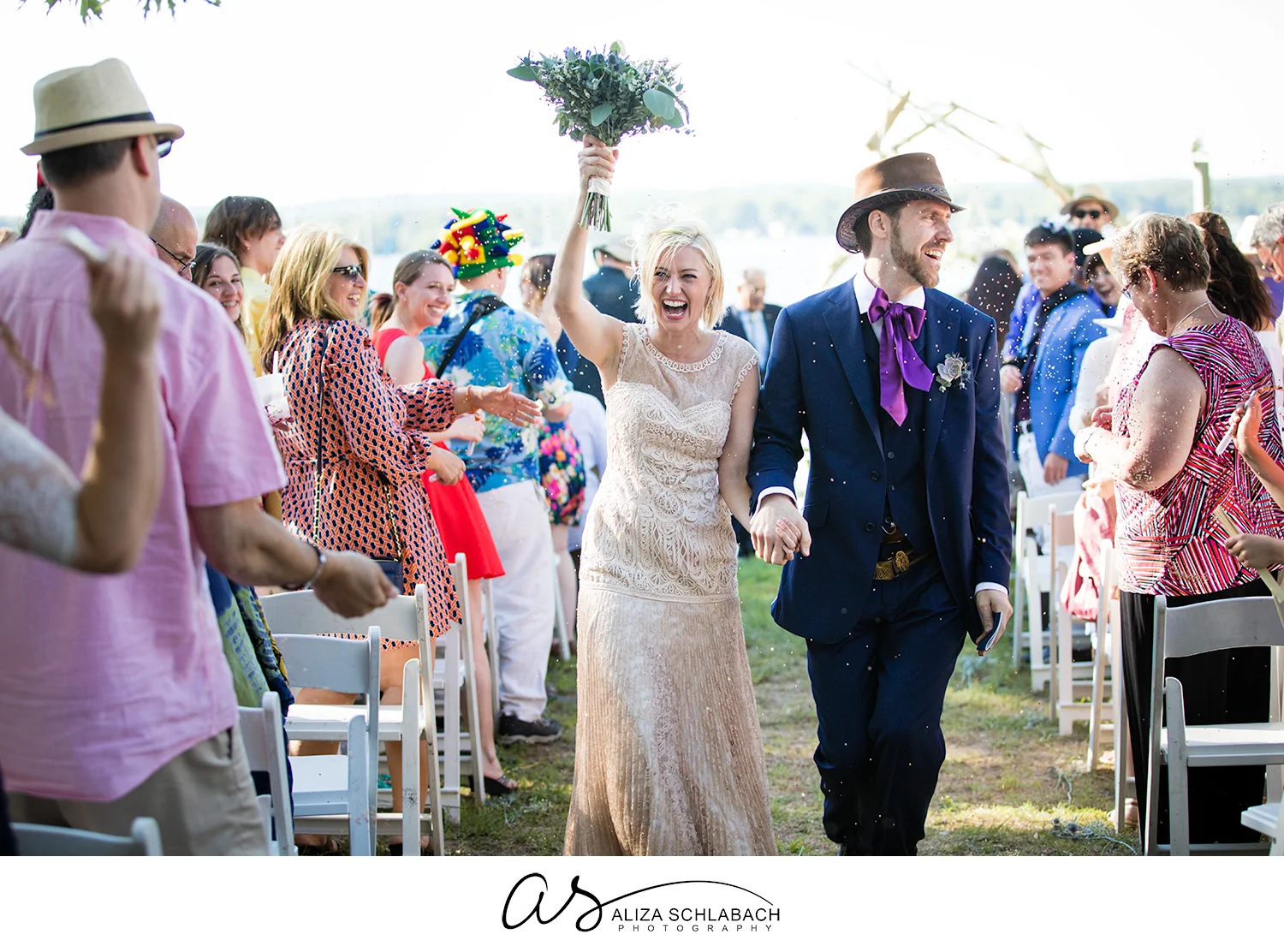 Photo of a bride and groom walking down the isle after their ceremony