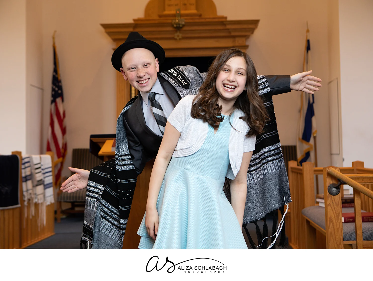 Cute photograph of Bar Mitzvah boy and his little sister