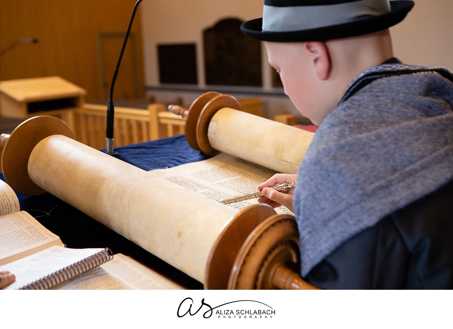 Photo of Bar Mitzvah boy reading from Torah