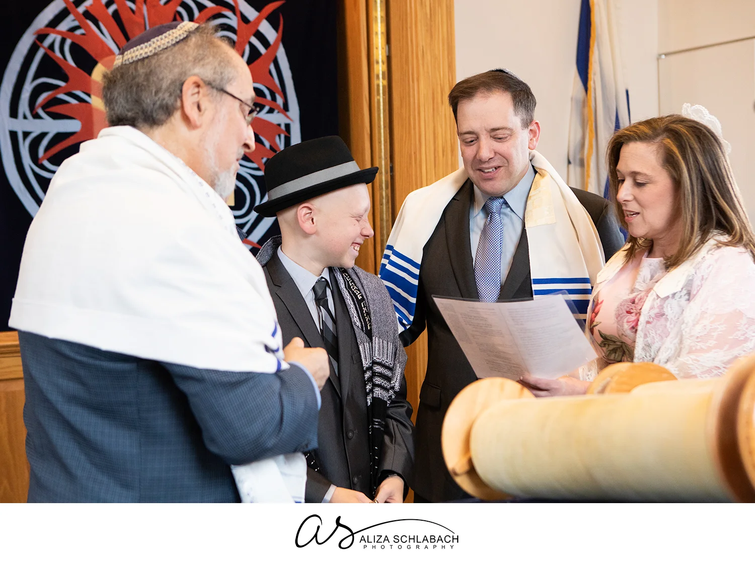 Photo of parents reading on bimah