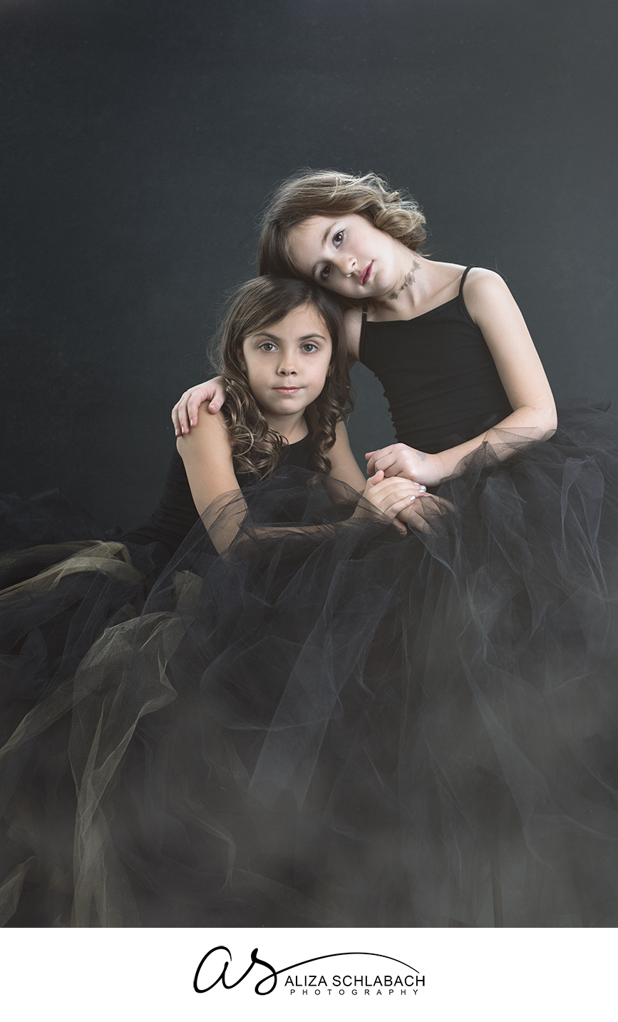 Dramatic portrait of 8 year old best girlfriends