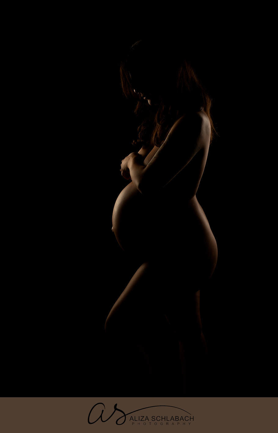 Golden maternity silhouette 