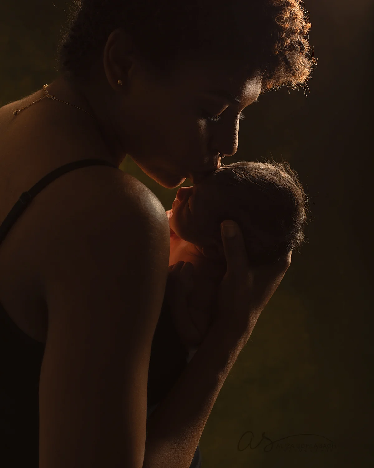 Newborn and mother silhouette