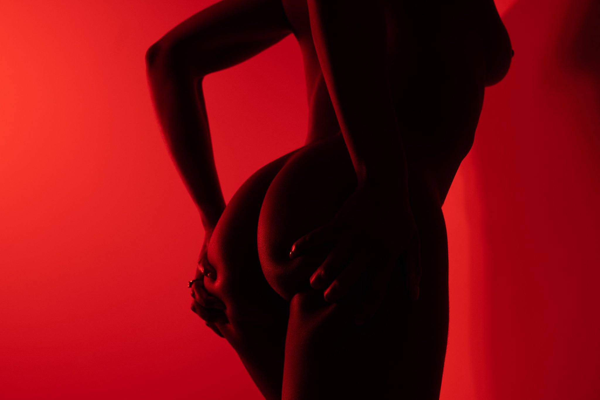 Red room booty shot boudoir photograph