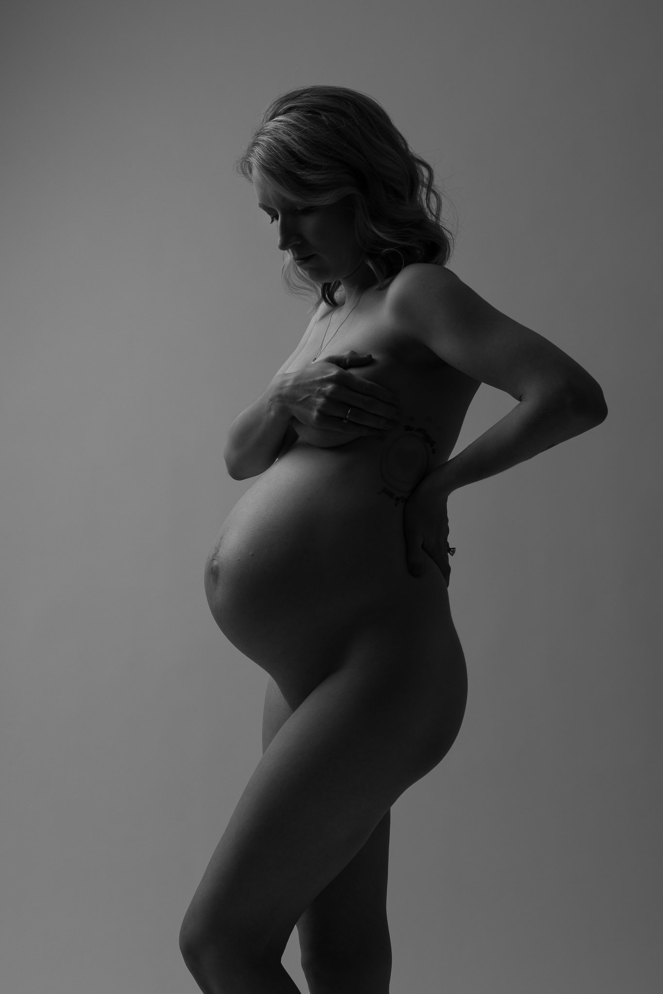 Black and white nude maternity portrait