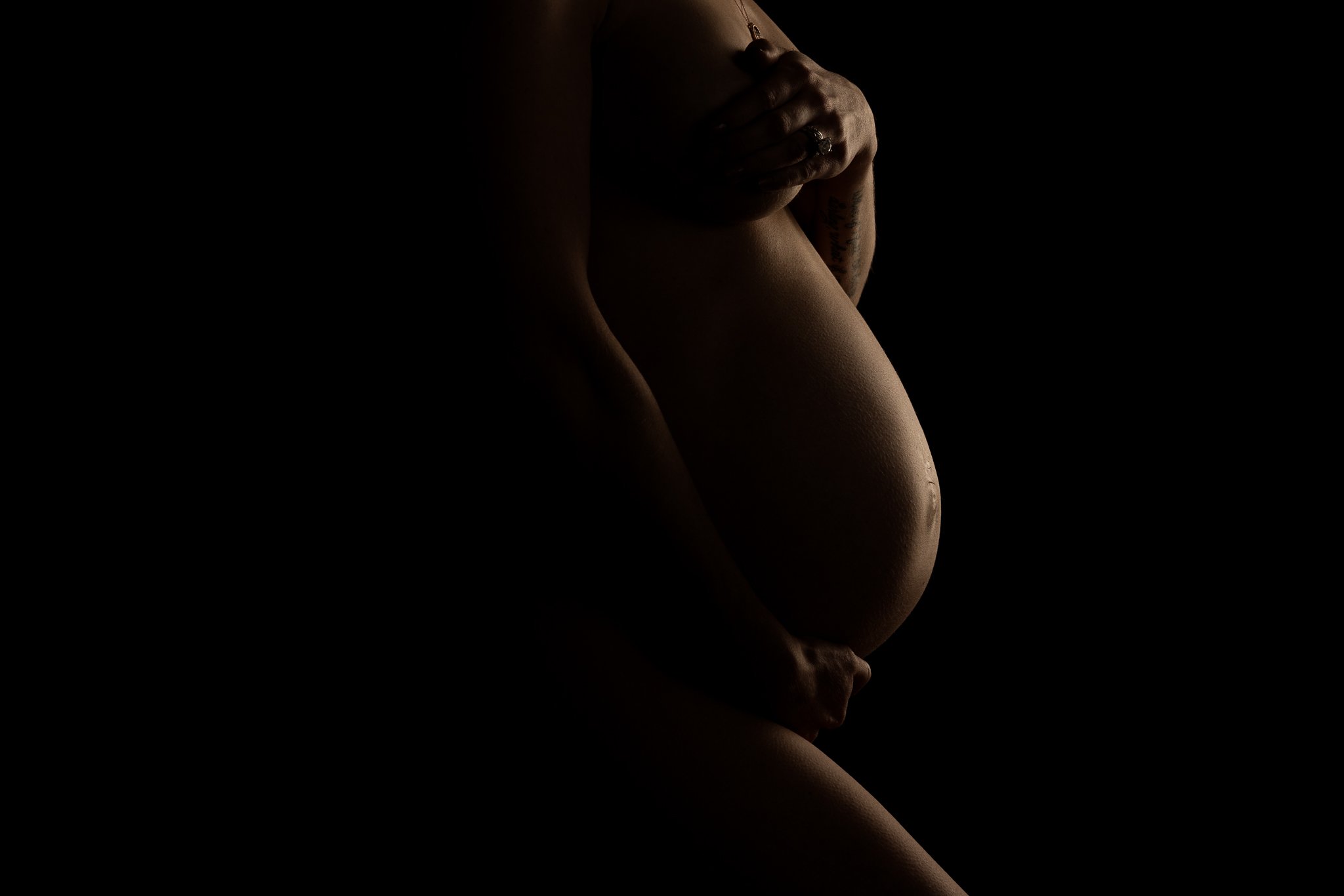 Nude silhouette of a pregnant woman