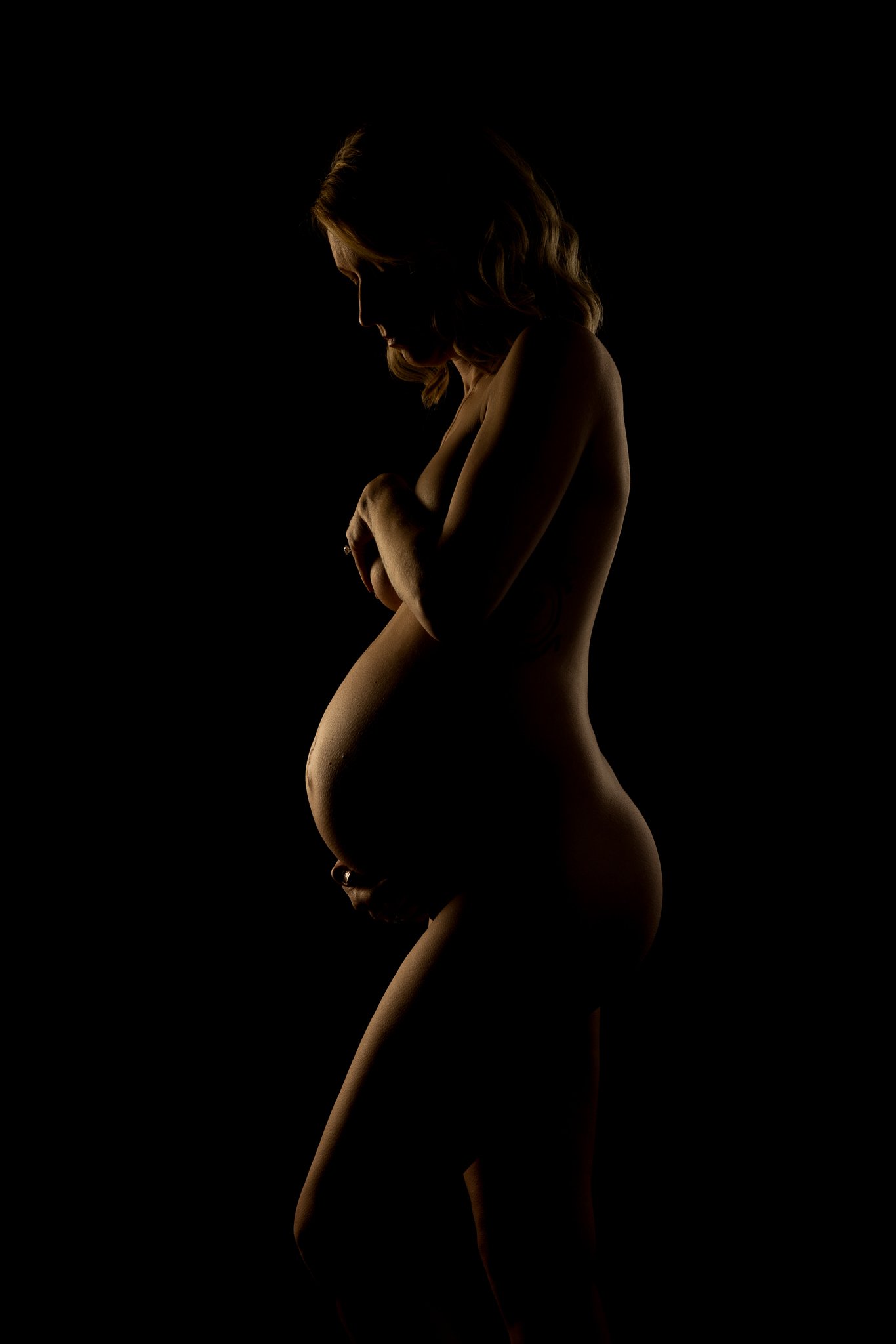 Nude maternity silhouette