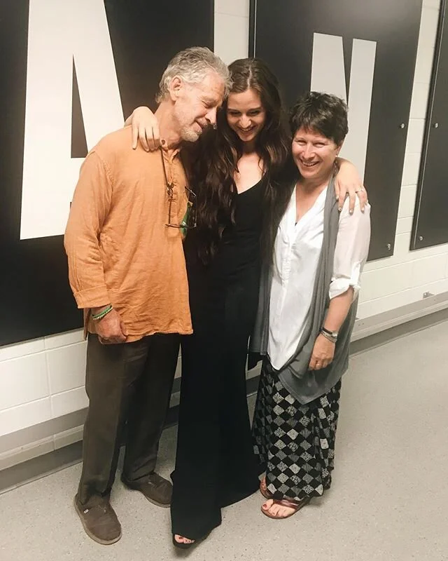 This picture was taken right after @panicatthedisco first Pray For the Wicked show in Minneapolis. This was right before my papa asked for one of our kombuchas from our dressing room rider and my parents left to go back to my hotel room. It was right