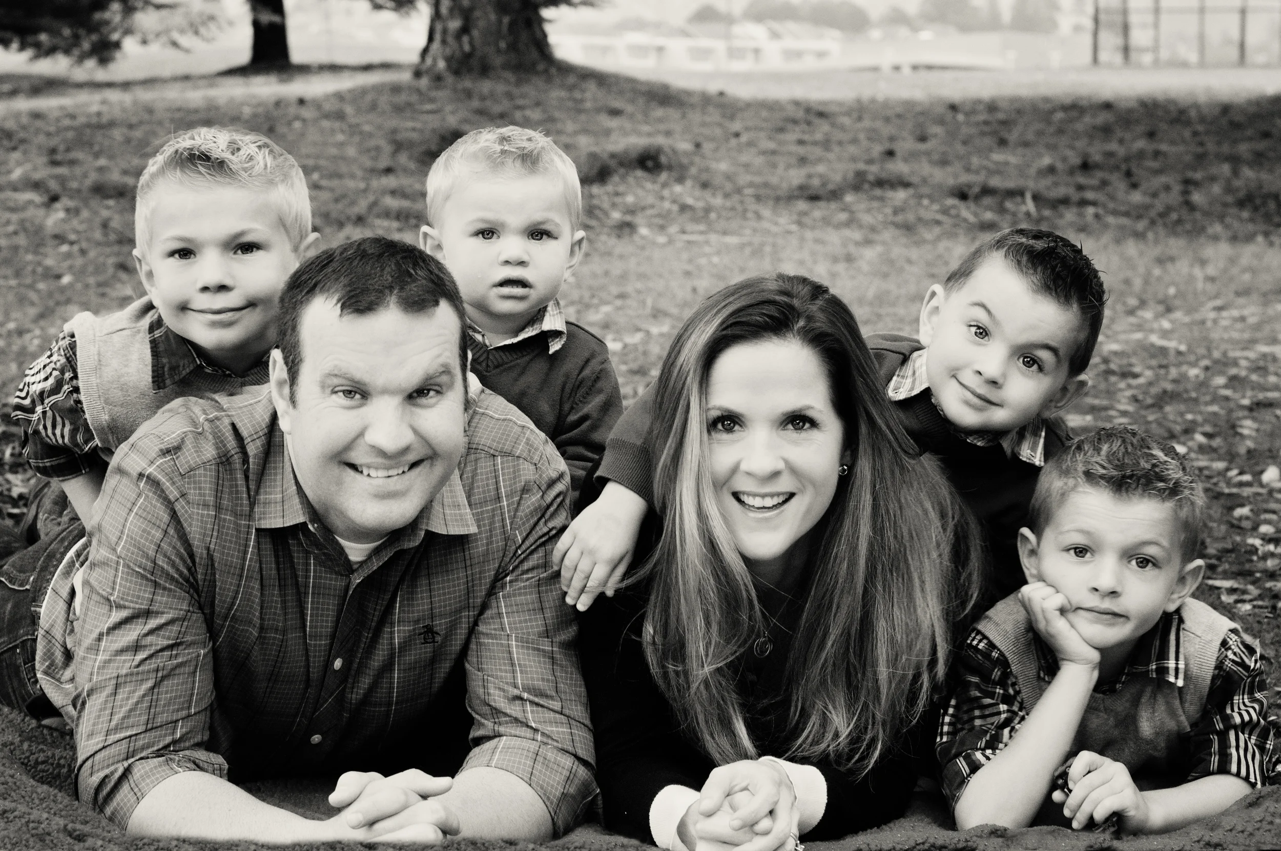 Anderson Family-Family laying in leaves platinum.jpg