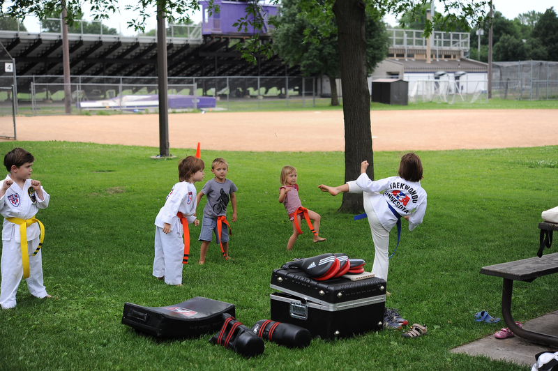 Sylvi warms up her first solo class of four Tiny Tigers.