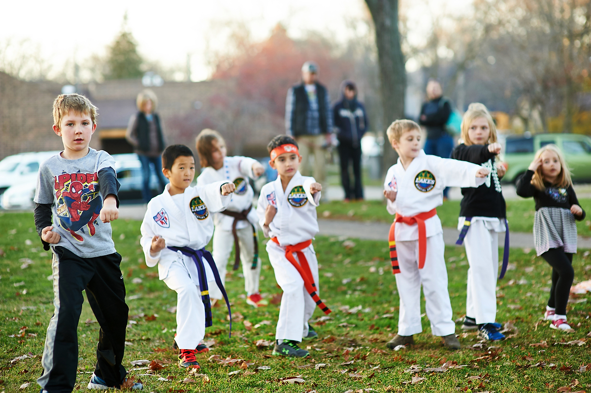 The Karate kids and tiny tigers know demonstrate exceelence in their focus in practing deep stances. deep stances help us maintain balance so we do not fall over like weak tree roots can topple a tree.