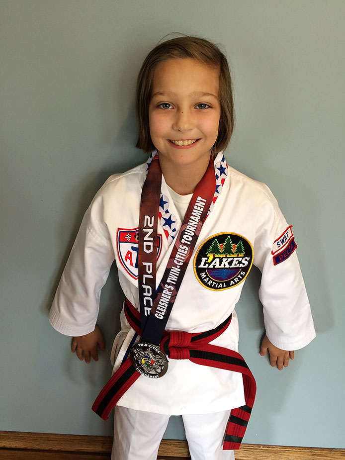 This Lakes Martial Arts student stands proud with her second place medal in forms competition. Congrats on the hard work, Sylvi, especially at your first tournament! "Internal rewards are those that affect you as a human. They often stay with you a long time. In some cases, this internal reward can affect your life forever," says Grandmaster H.U. Lee.