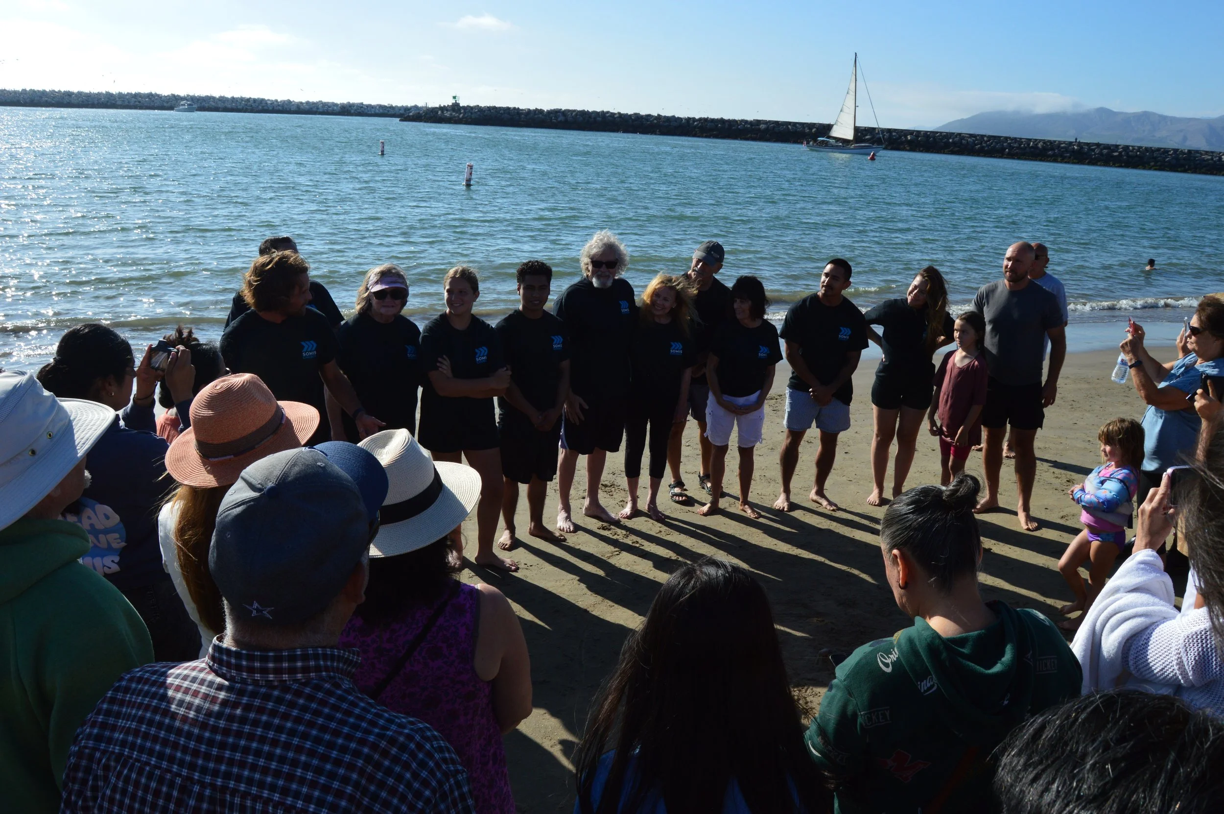 People serving at Somis church baptism event at the beach in Ventura