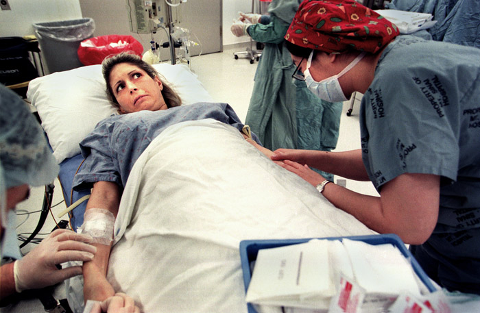 Being prepped, Lisa has a short moment of fear and confusion as the sedative takes hold and she is asked to count backwards from 100...she makes it to 94.