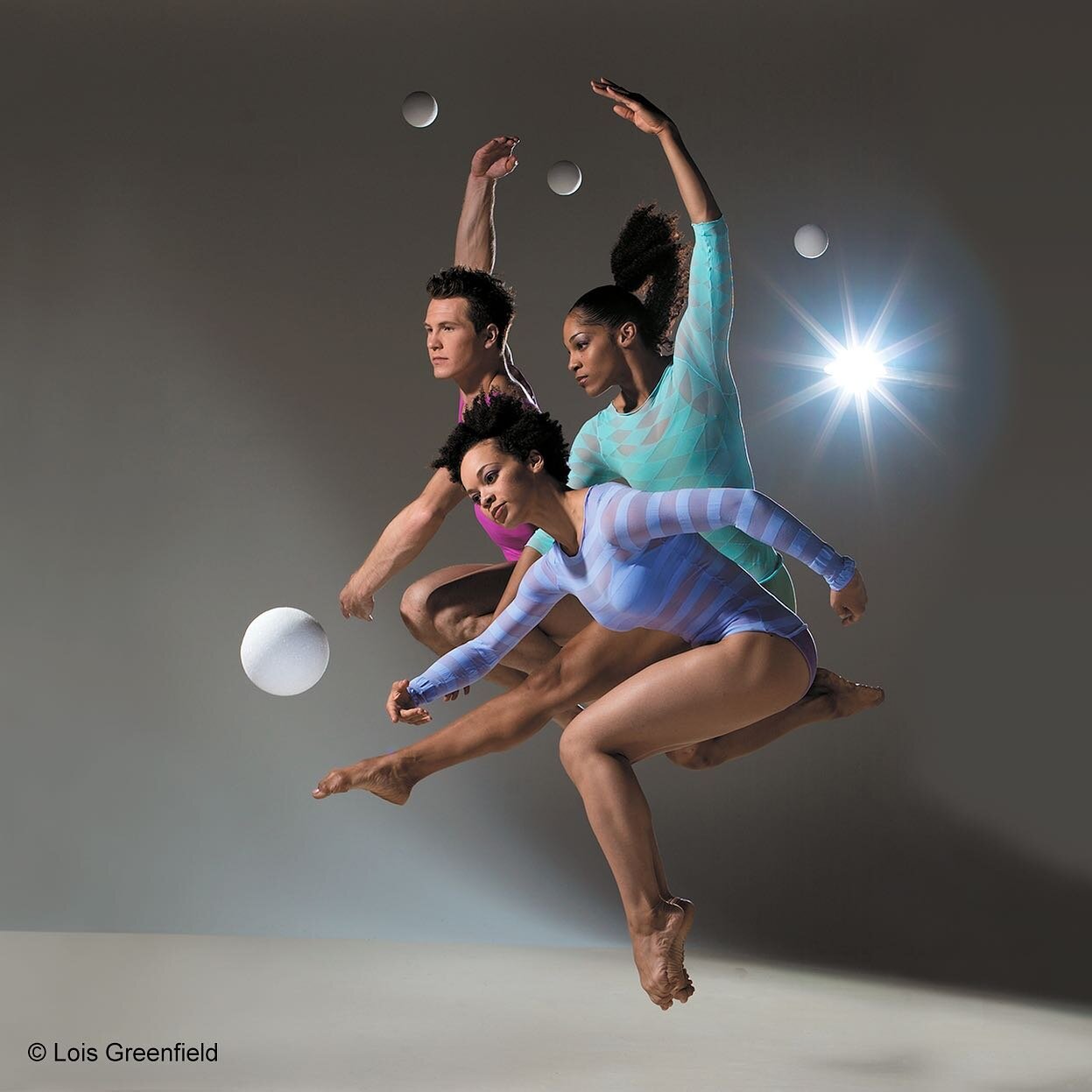 Like planets in orbit, Marty Lawson, Mia McSwain, and Sumayah McRae of Parsons Dance eclipse one another.

#Broncolor #BroncolorWallCalendar #LoisGreenfield #MartyLawson #MiaMcSwain #SumayahMcRae #ParsonsDance #contemporarydance #dancephotographer #d