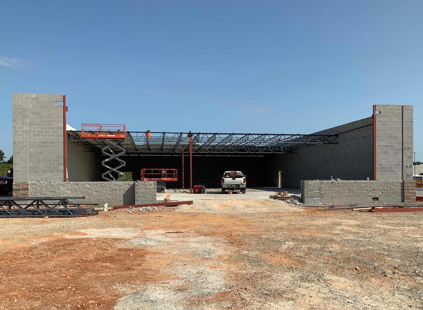We&rsquo;re kicking this week off by setting bar joists at this retail project in Huntsville. #builtbetter