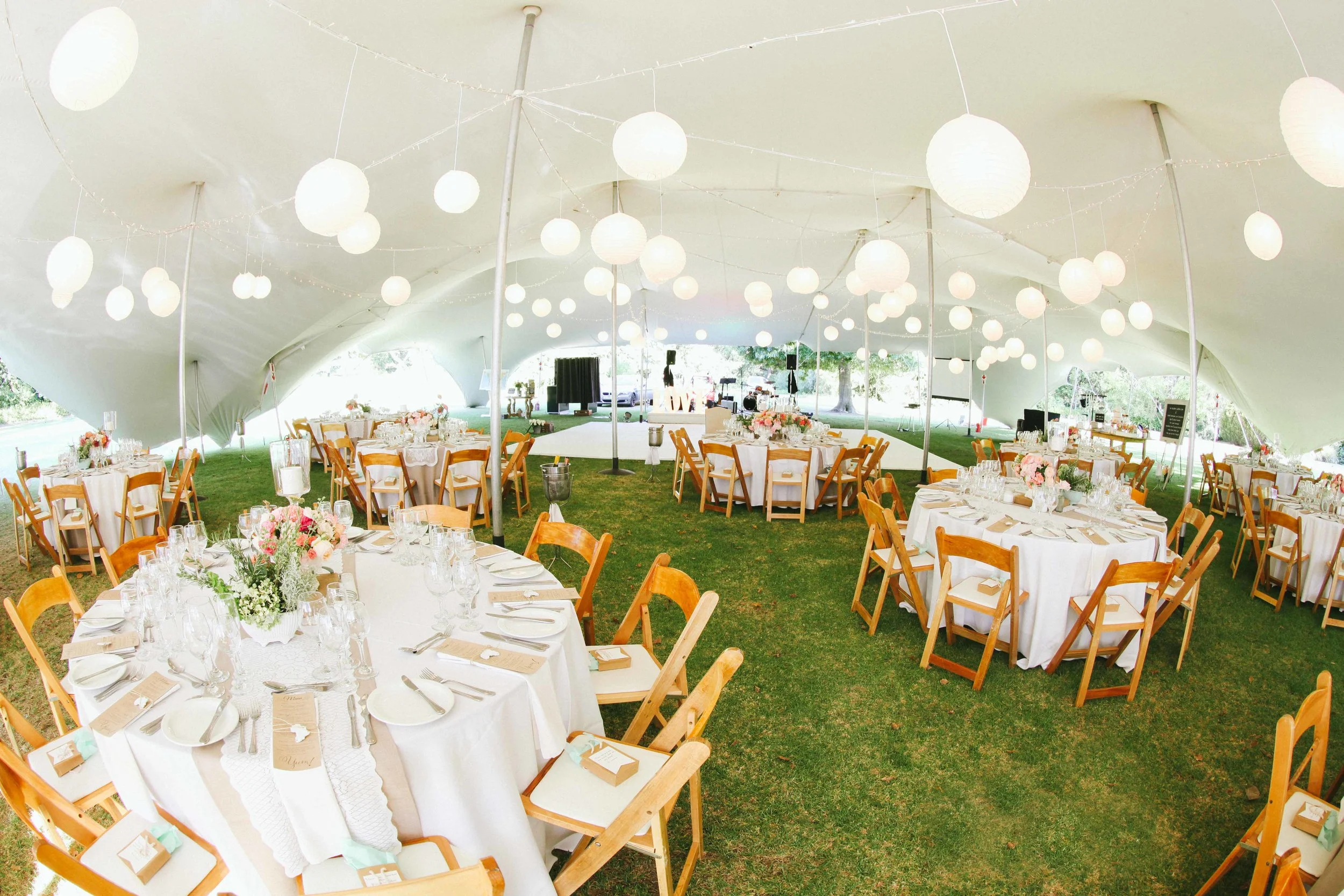 Outdoor Wedding Reception Under A Tent