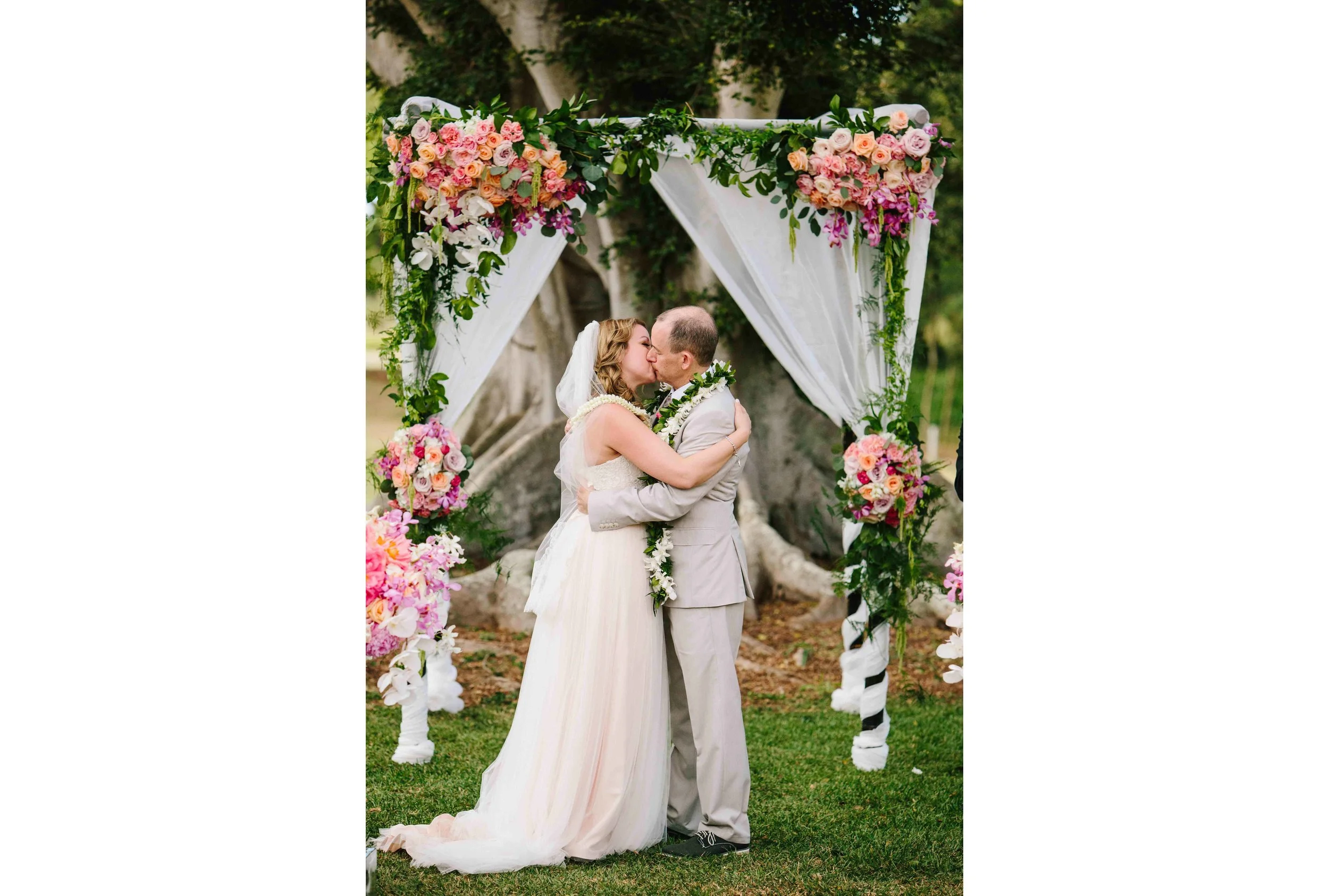 Kiss Beneath The Wedding Arch