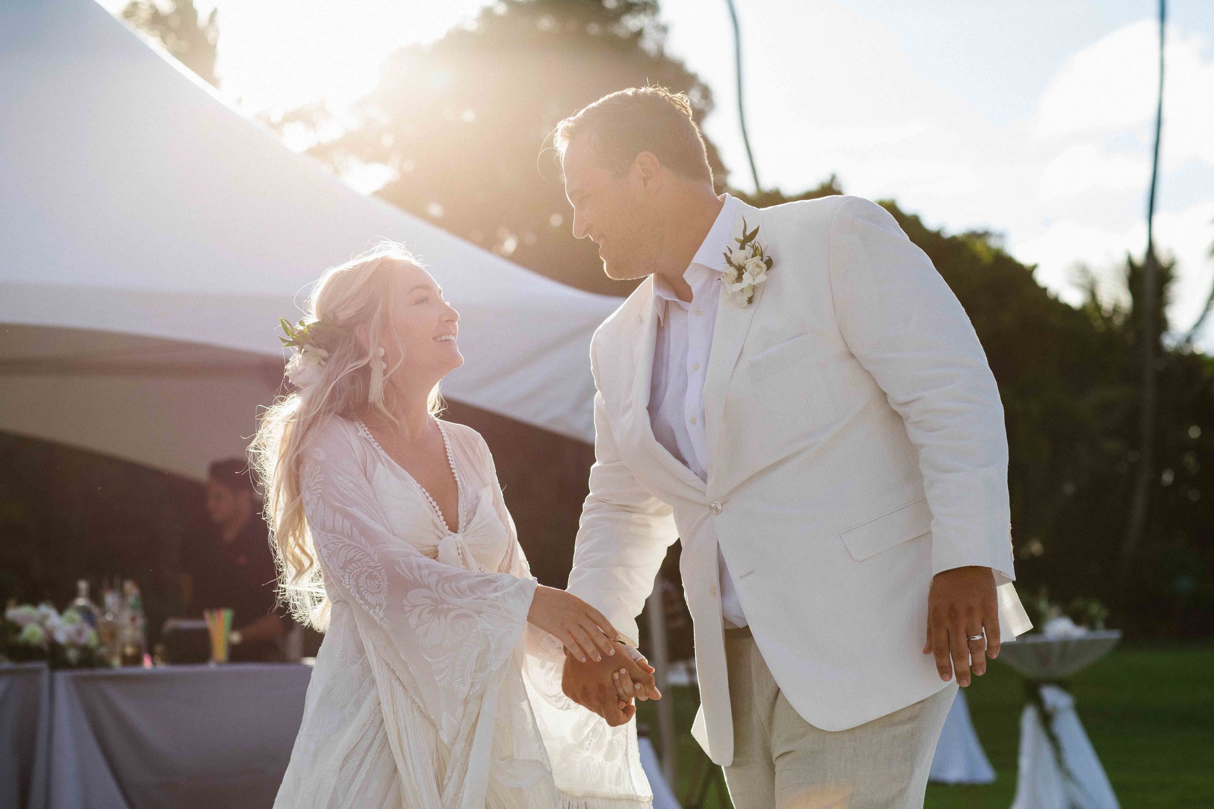 Backlit Wedding Photography of Bride and Groom