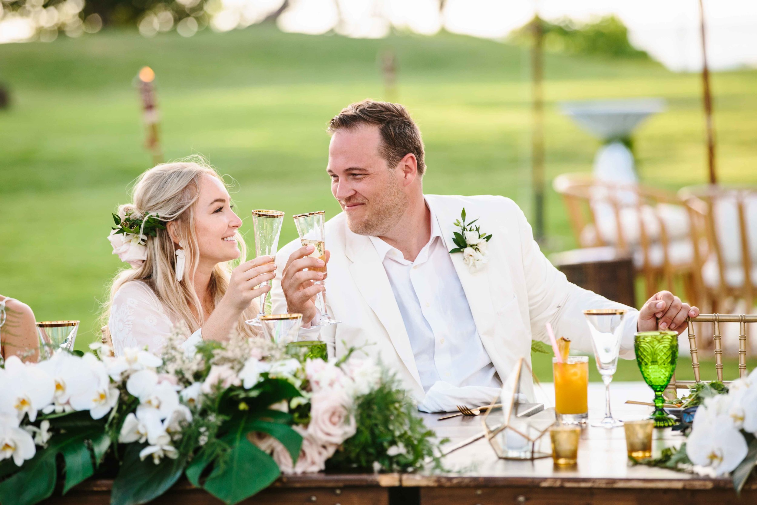 Bride and Groom Toasting at Hawaii Wedding Reception