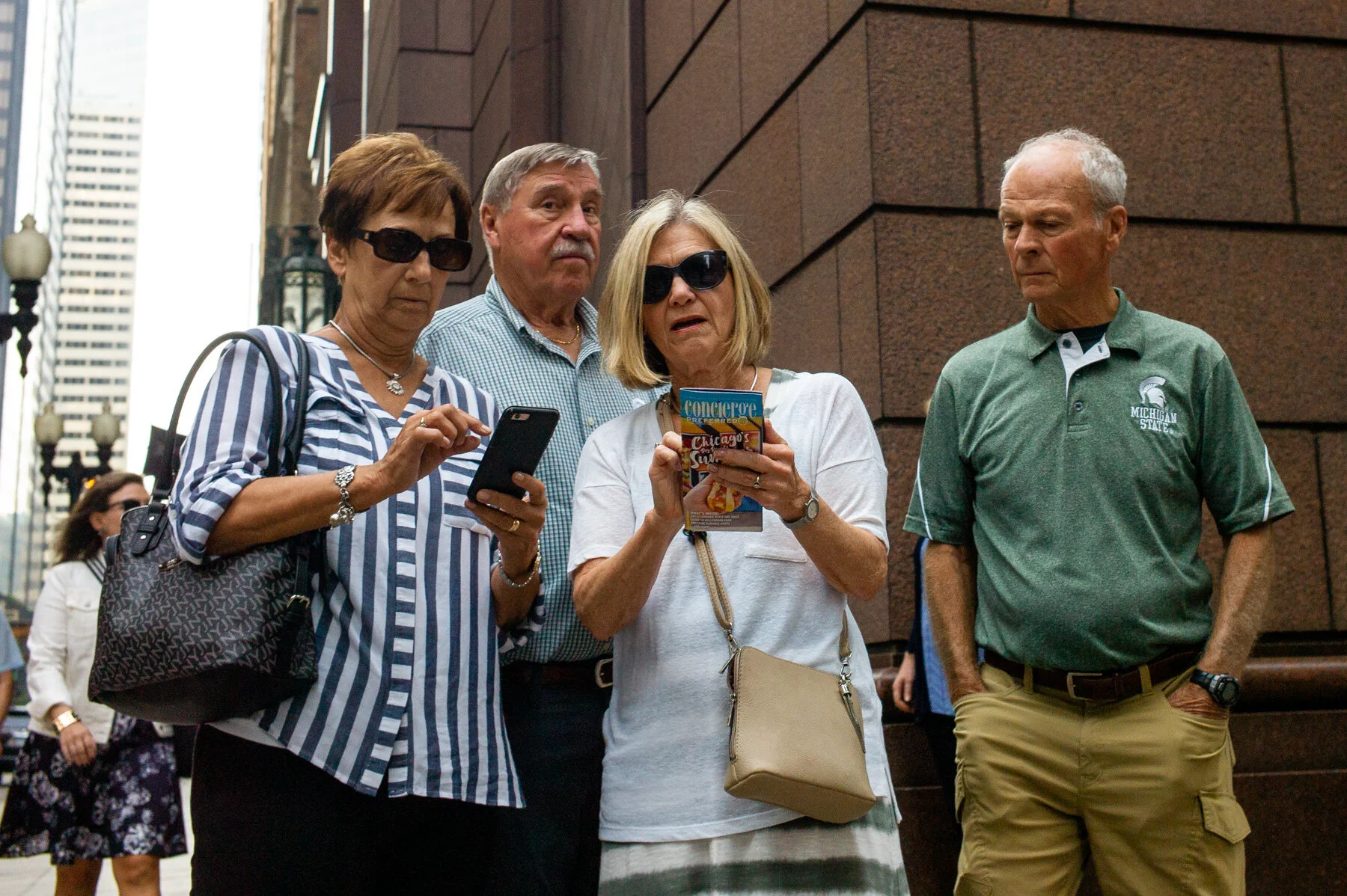 Some tourists getting their bearings. Only 1 of the 4 saw me!