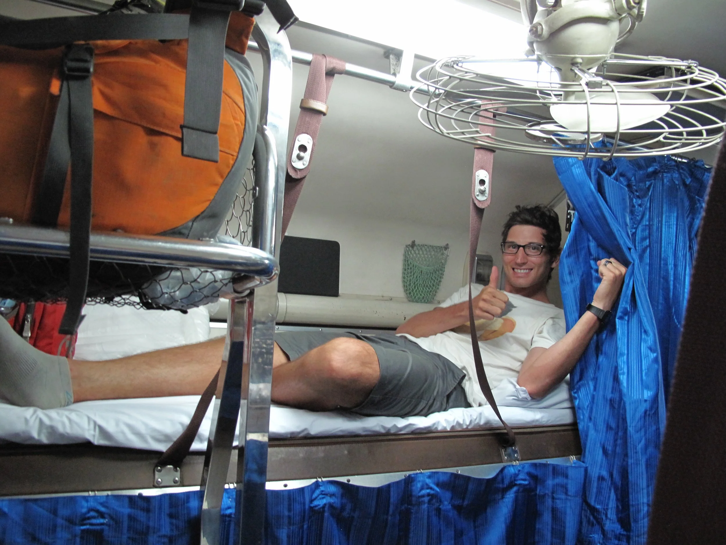 Loving life on the overnight train during our 28 hour adventure between Laos and Myanmar