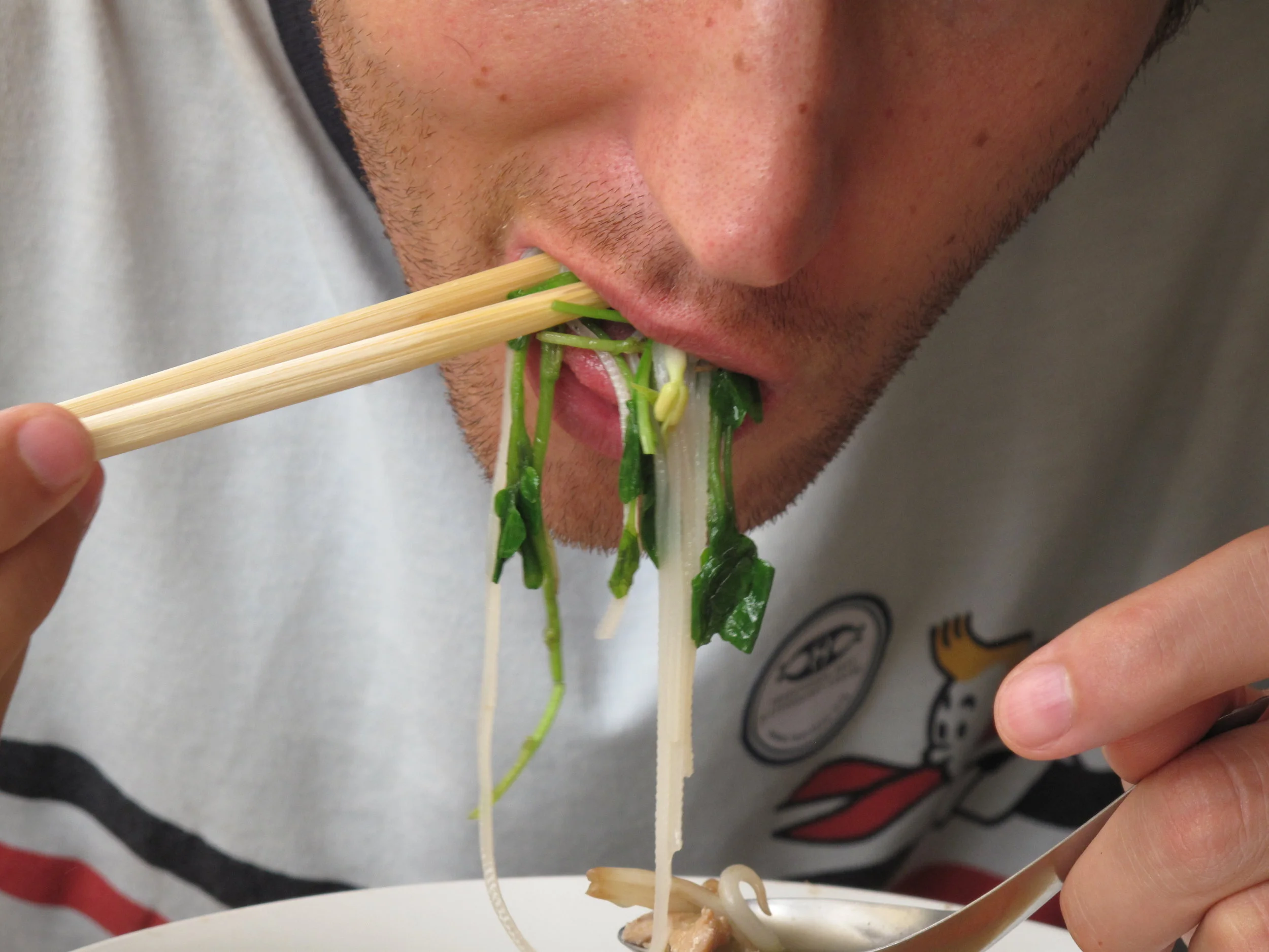 Zev enjoying the street food in Luang Prabang, Laos