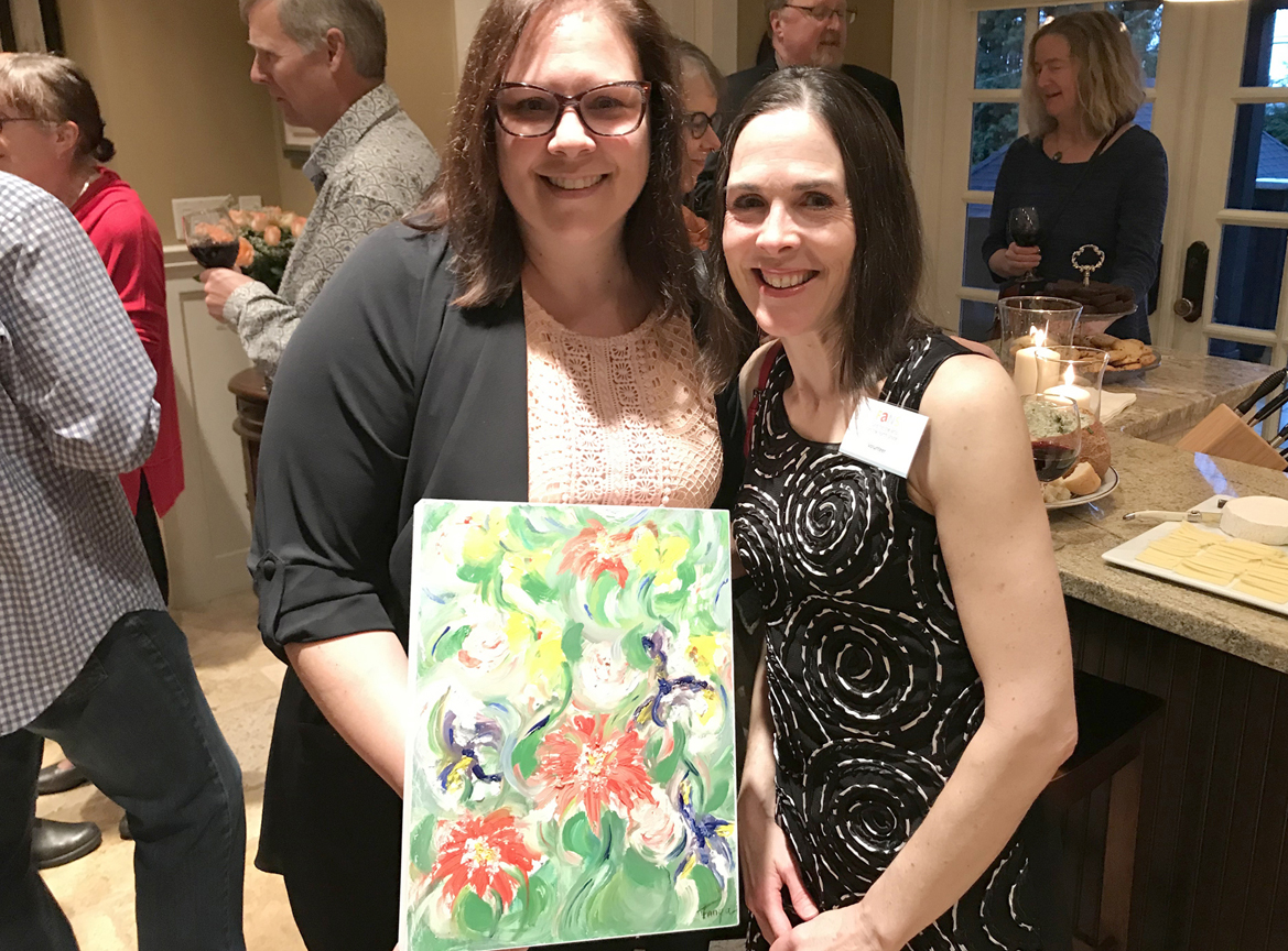  Artist Tanya Vipond (Right) with her painting purchased by appreciative guest  