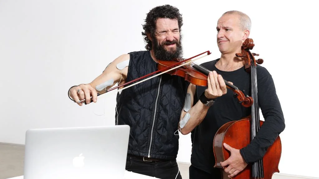    Shocking Clichés:  Australian Art Quartet hooked up to electric shock nodes in concert designed to push some buttons  