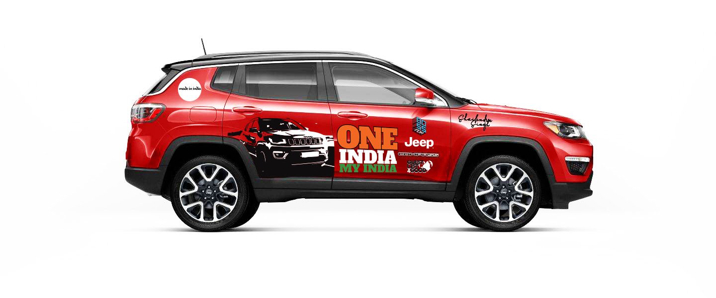 Side of red Jeep Compass