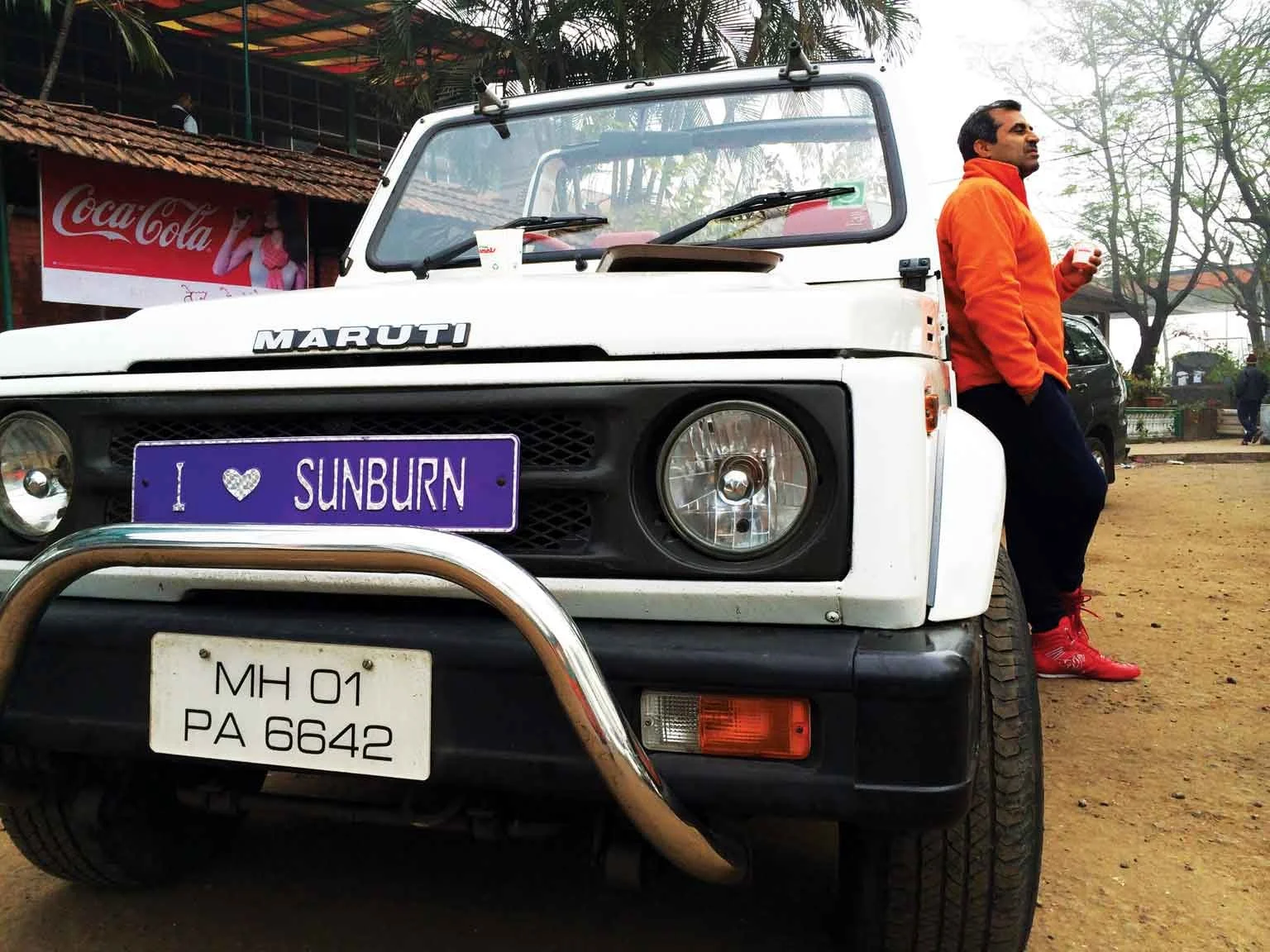 Shailendra Singh stands next to his infamous Sunburn Jeep