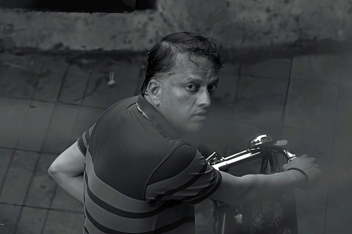 Pradip Gogate in a still from Ladoo (2025) — Marathi black and white drama directed by Shailendra Singh