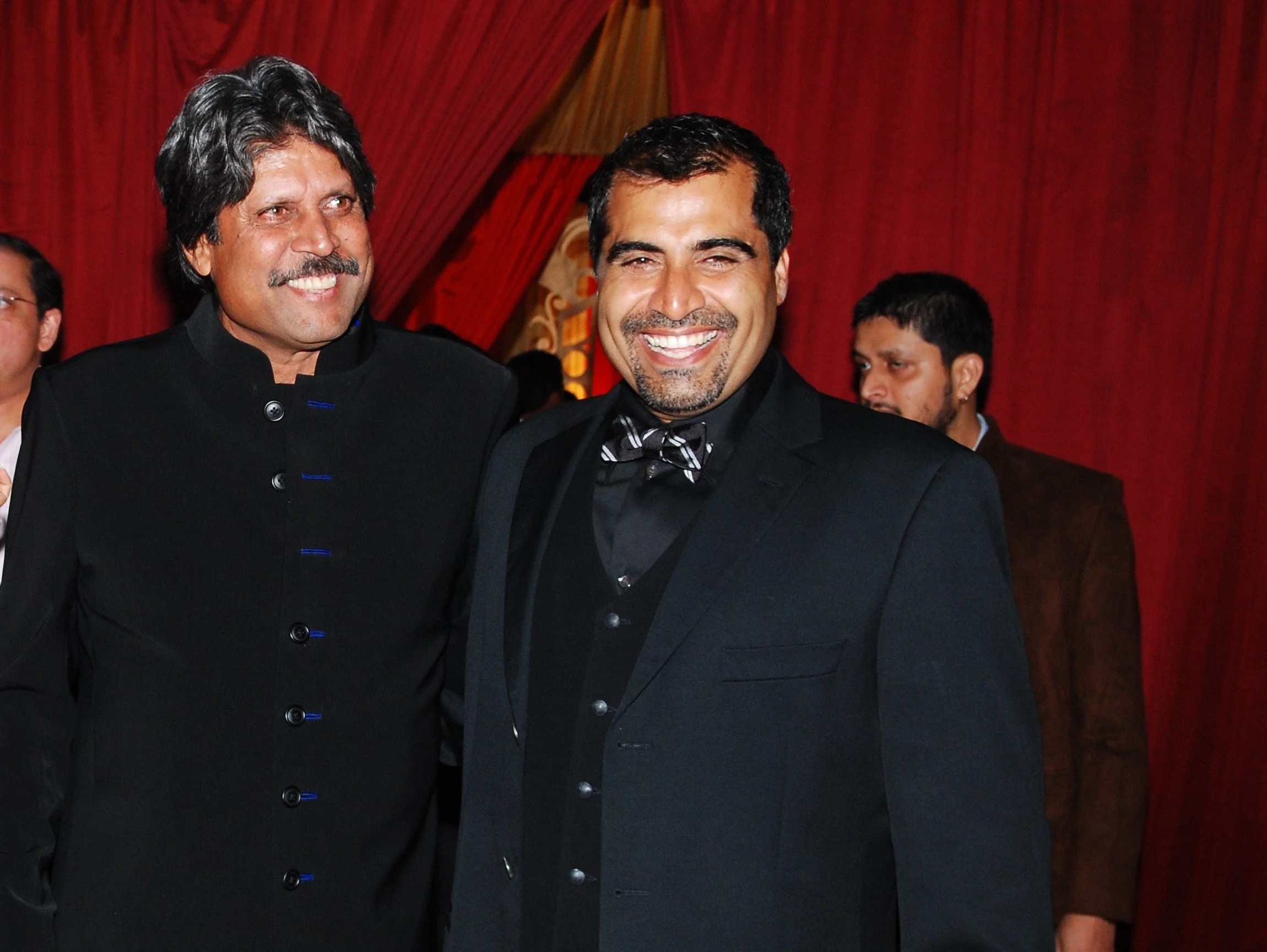 Shailendra Singh with Kapil Dev, Cricketer of the Millennium, at a formal Percept event